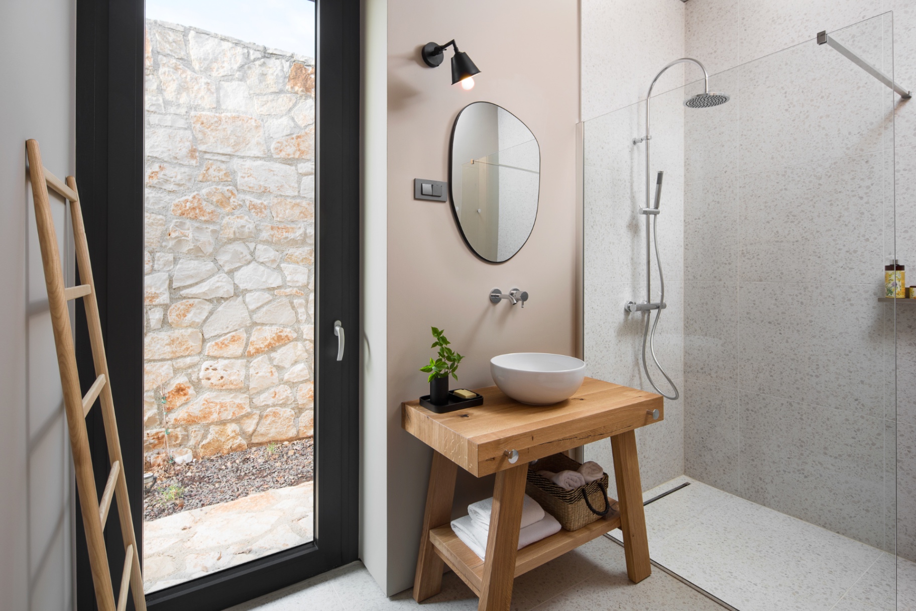 Stone-walled walk-in shower