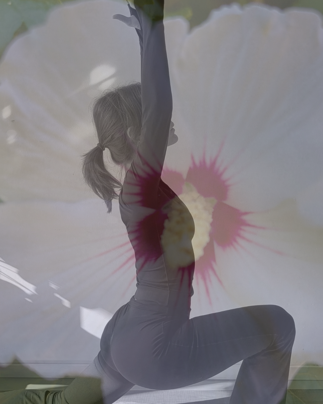 Yoga pose layered with a soft hibiscus bloom